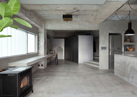 Bare-concrete-apartment-by-Airhouse-Design-Office-presents-its-own-fashion-exhibitions_dezeen_10