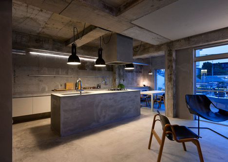 Bare-concrete-apartment-by-Airhouse-Design-Office-presents-its-own-fashion-exhibitions_dezeen_15
