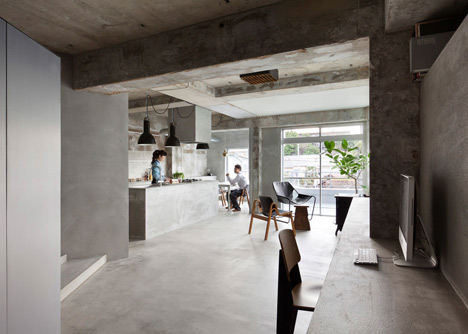 Bare-concrete-apartment-by-Airhouse-Design-Office-presents-its-own-fashion-exhibitions_dezeen_2
