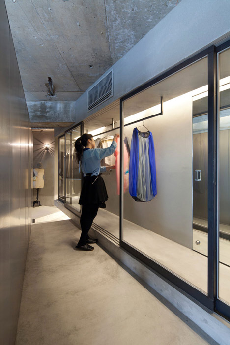 Bare-concrete-apartment-by-Airhouse-Design-Office-presents-its-own-fashion-exhibitions_dezeen_7