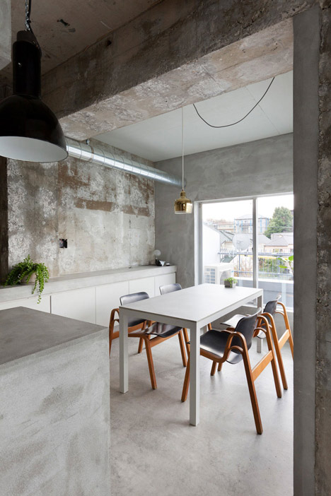 Bare-concrete-apartment-by-Airhouse-Design-Office-presents-its-own-fashion-exhibitions_dezeen_9